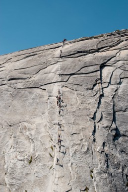Climbing half dome cables, Yosemite, California USA